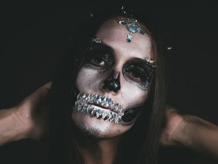 Gothic Halloween Y3K makeup — icy chrome eyes, dark cool-berry lip and silver graphic liner
